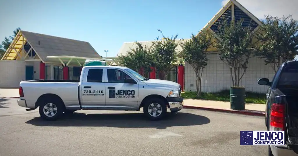 Jenco Construction's silver pickup truck lettered with 720-2116, JENCO CONSTRUCTION and jencoconstruction.com